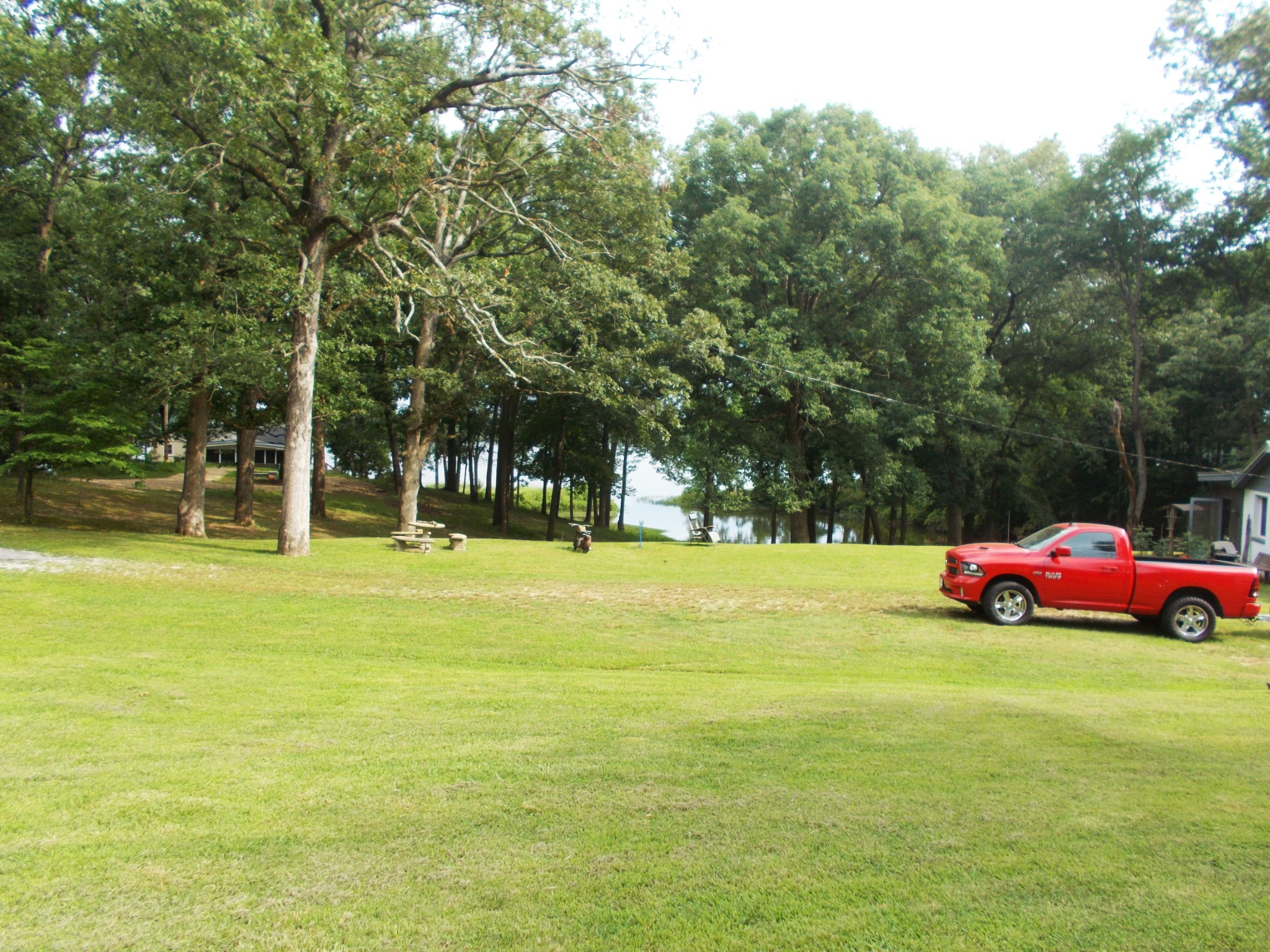 979 Highlander Road Camden, TN 38320 - Photo 13 of 23 a view of yard with swimming pool and green space