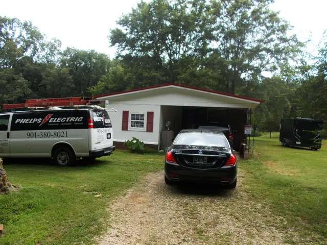 a car parked in front of a house with a parked car