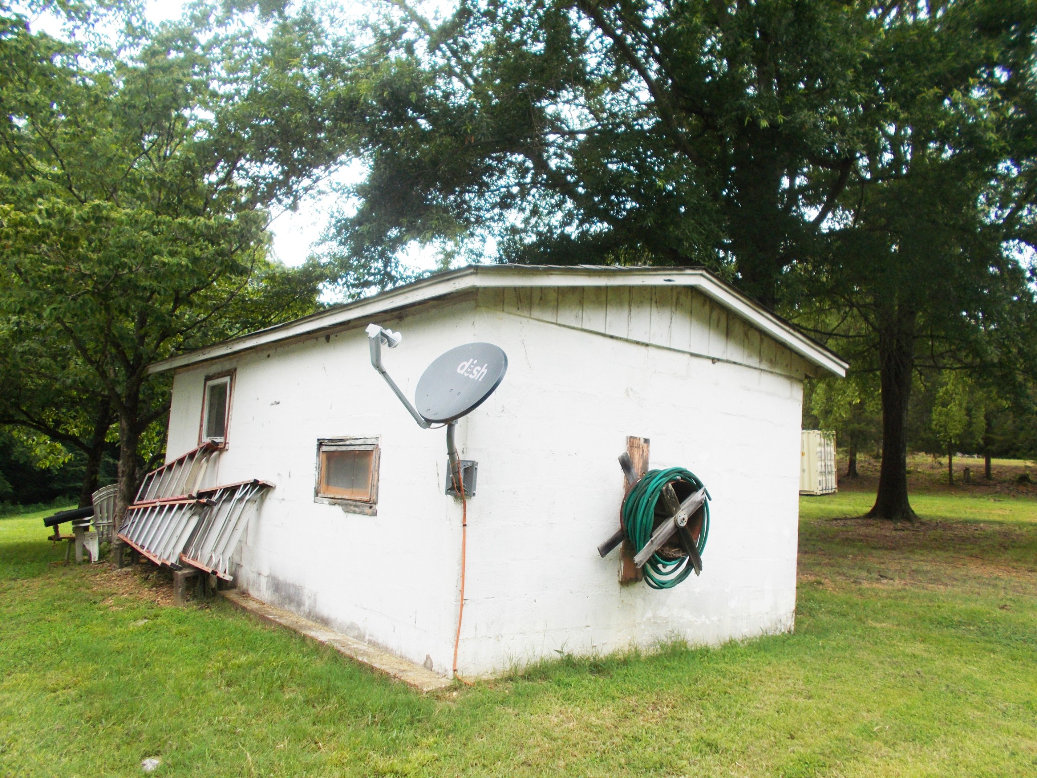 979 Highlander Road Camden, TN 38320 - Photo 16 of 23 a view of backyard with deck and garden