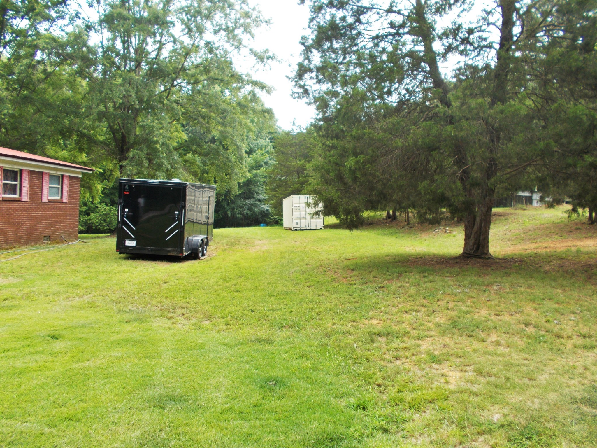 979 Highlander Road Camden, TN 38320 - Photo 17 of 23 a view of a lake with a yard