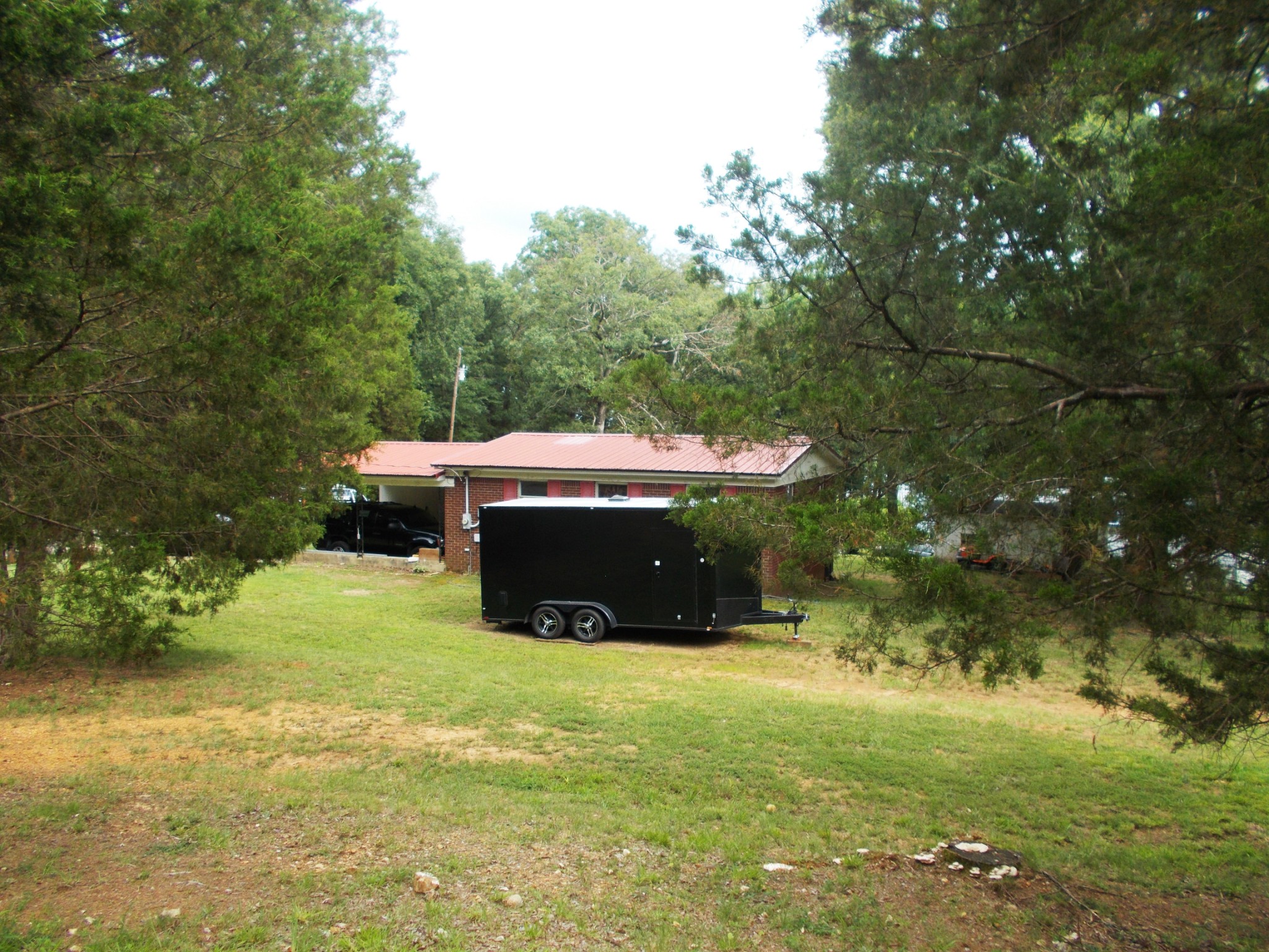 979 Highlander Road Camden, TN 38320 - Photo 19 of 23 a view of an outdoor space and yard