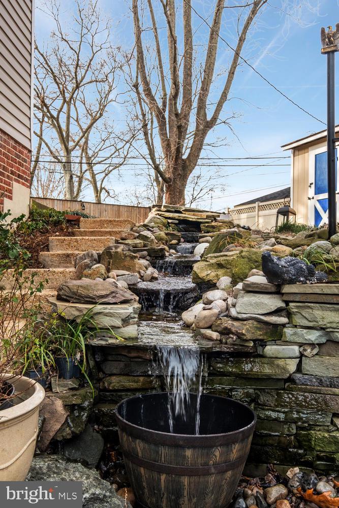 200 Stonewall Road Baltimore, MD 21228 - Photo 41 of 46 pond/water fall