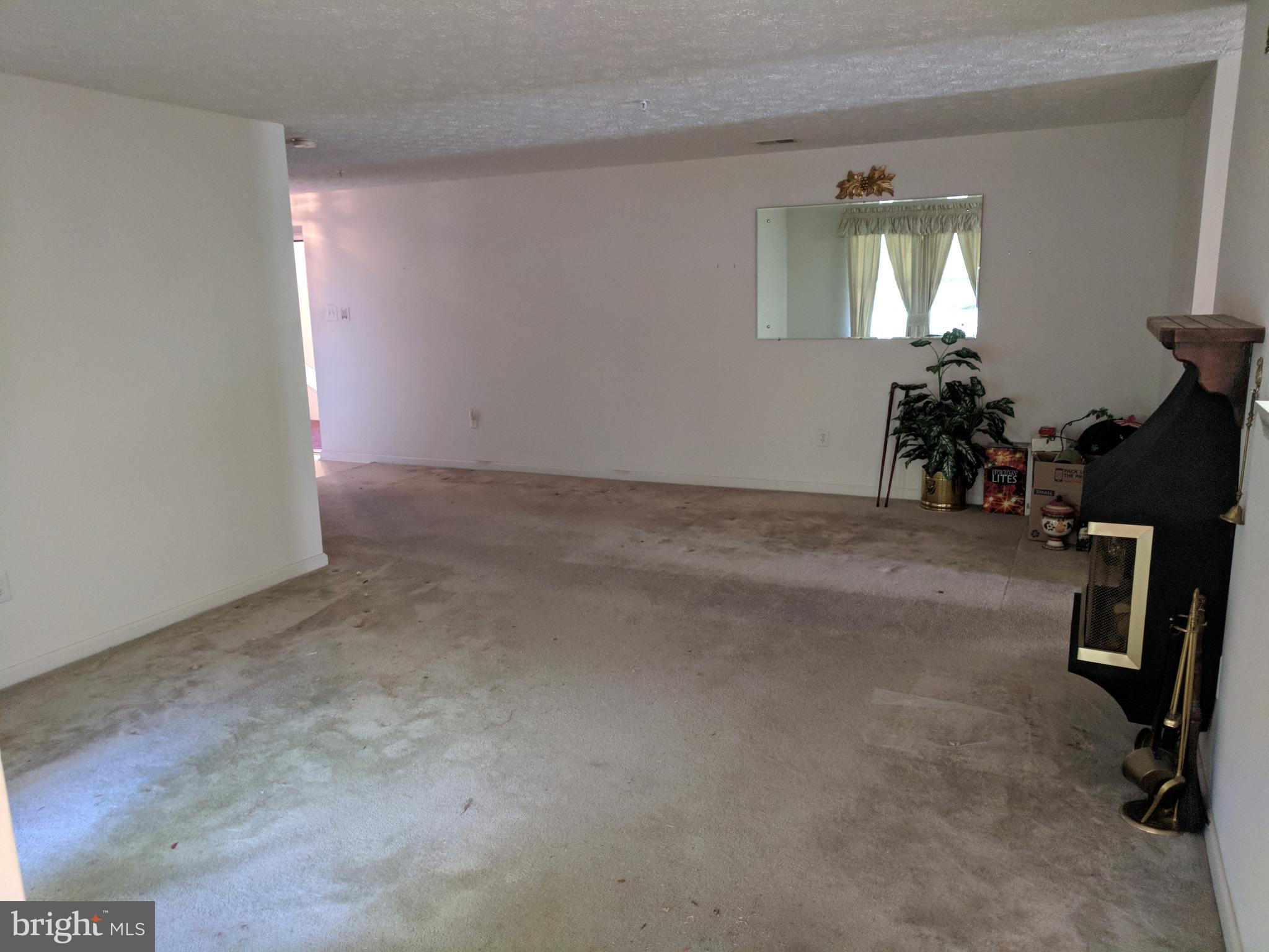 4862 Shellbark Road, Unit F Owings Mills, MD 21117 - Photo 16 of 20 wooden floor and window in a room