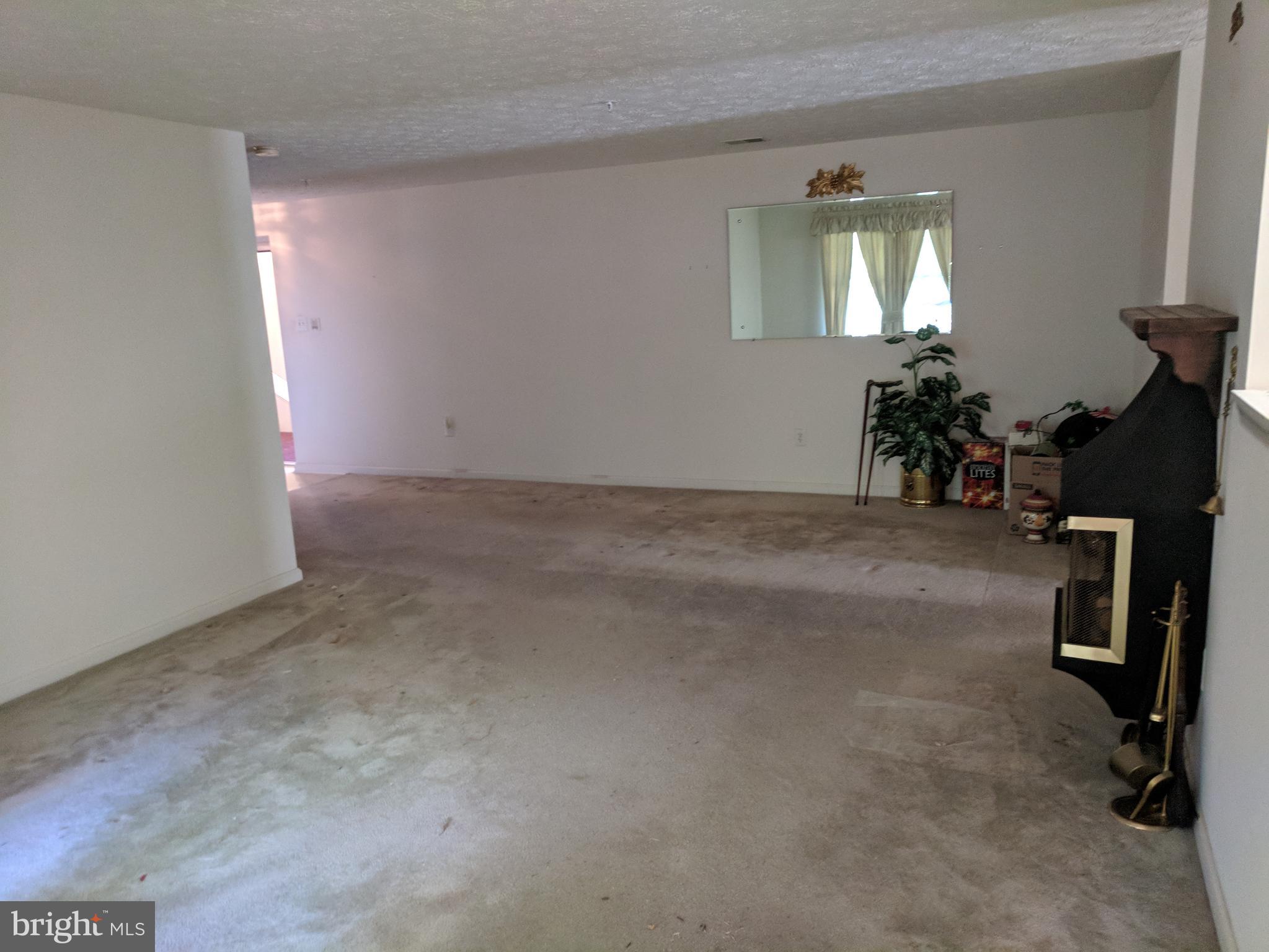 4862 Shellbark Road, Unit F Owings Mills, MD 21117 - Photo 6 of 20 a view of a room with gym equipment
