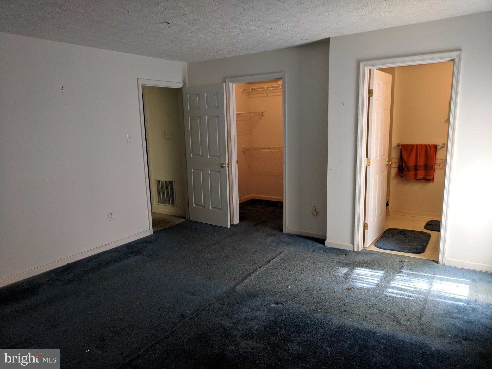 4862 Shellbark Road, Unit F Owings Mills, MD 21117 - Photo 7 of 20 an empty room with windows