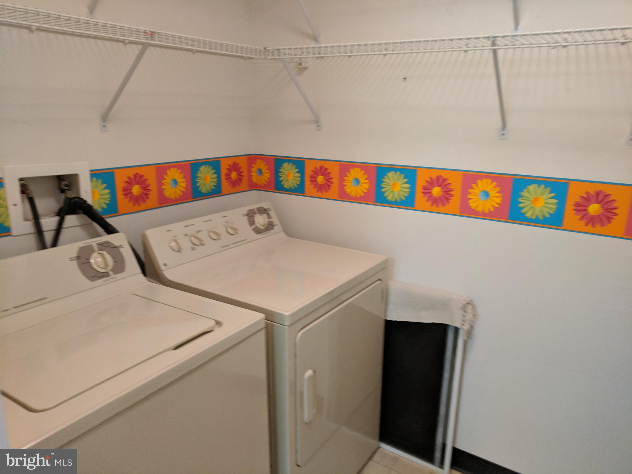 4862 Shellbark Road, Unit F Owings Mills, MD 21117 - Photo 10 of 20 a utility room with dryer and washer