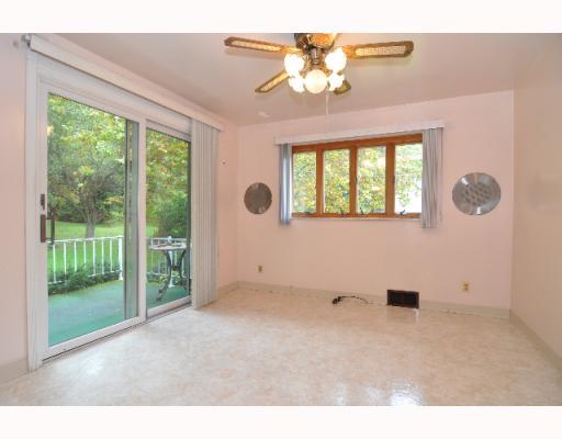 498 Chapel Road Aliquippa, PA 15001 - Photo 16 of 18 Dining Room. Open Dining room opening onto the rear deck area.