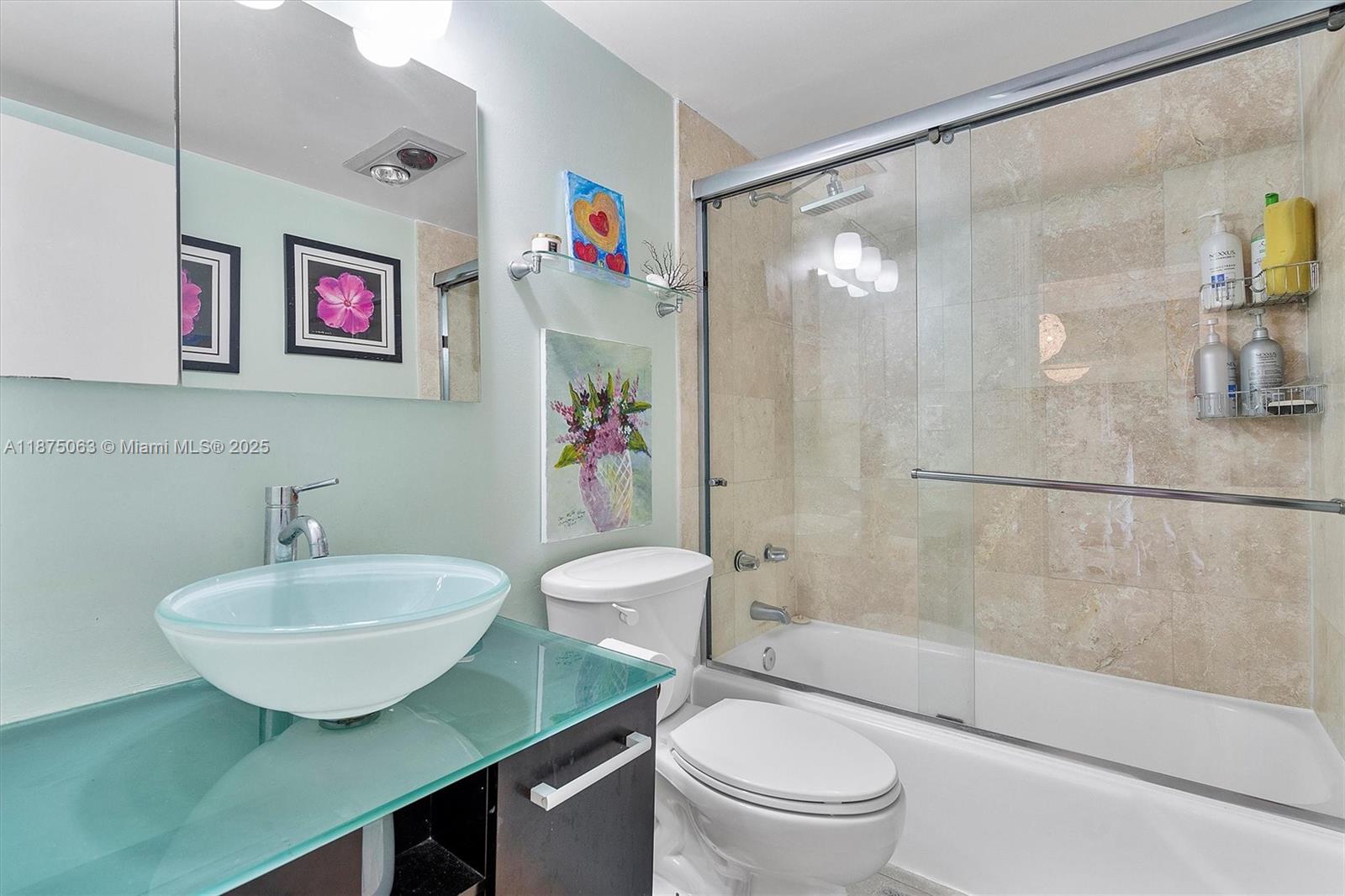 1980 South Ocean Drive, Unit 7N Hallandale Beach, FL 33009 - Photo 8 of 12 a bathroom with a sink mirror bathtub and toilet