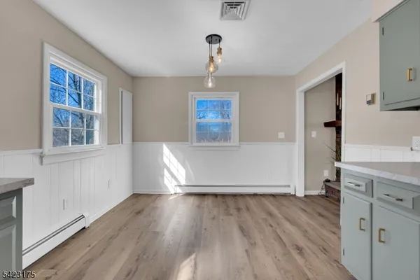 a view of livingroom with furniture and wooden floor
