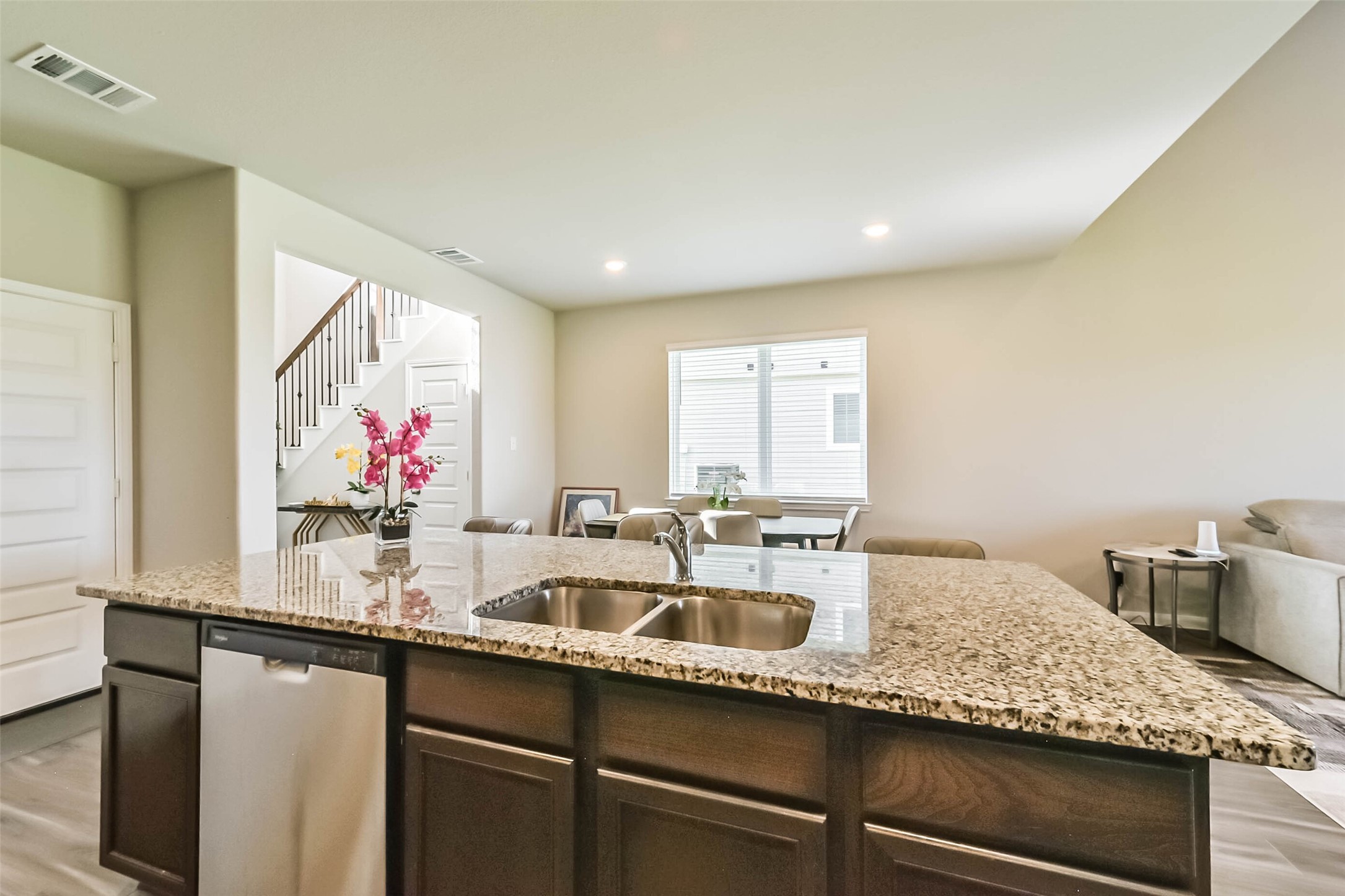 4907 Luke Matthew Drive Rosharon, TX 77583 - Photo 13 of 42 a kitchen with granite countertop a sink and a white wooden cabinets