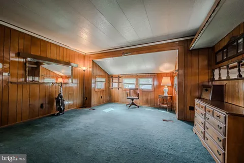 a kitchen with stainless steel appliances granite countertop a stove and a refrigerator