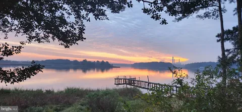 a view of a lake in front of house