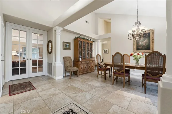 a view of a backyard with a patio and plants