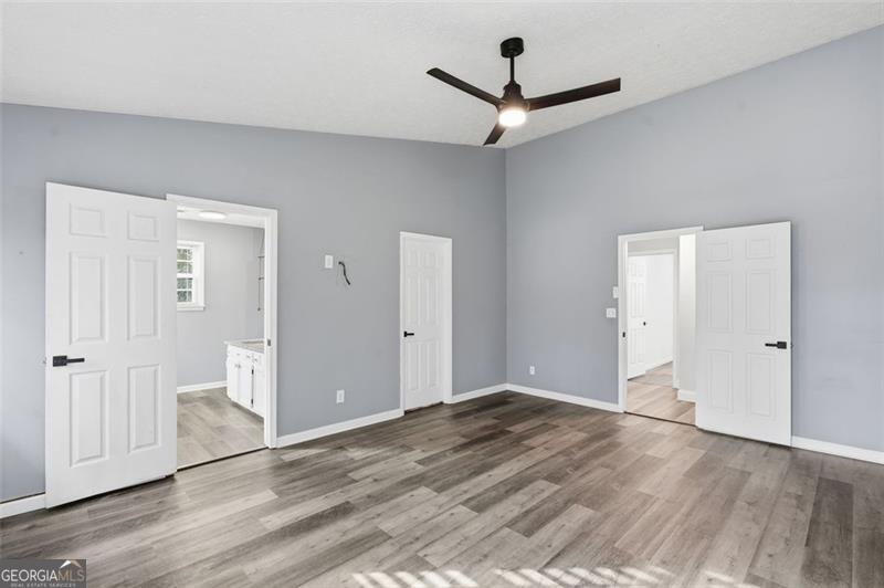 4450 Dorsett Shoals Road Douglasville, GA 30135 - Photo 23 of 36 wooden floor in an empty room