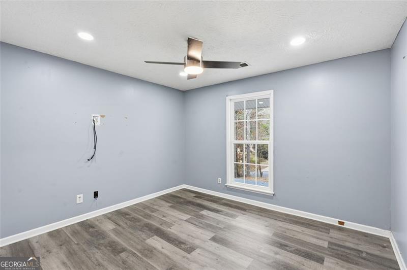 4450 Dorsett Shoals Road Douglasville, GA 30135 - Photo 28 of 36 an empty room with a window