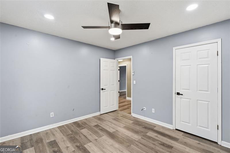 4450 Dorsett Shoals Road Douglasville, GA 30135 - Photo 29 of 36 wooden floor in an empty room