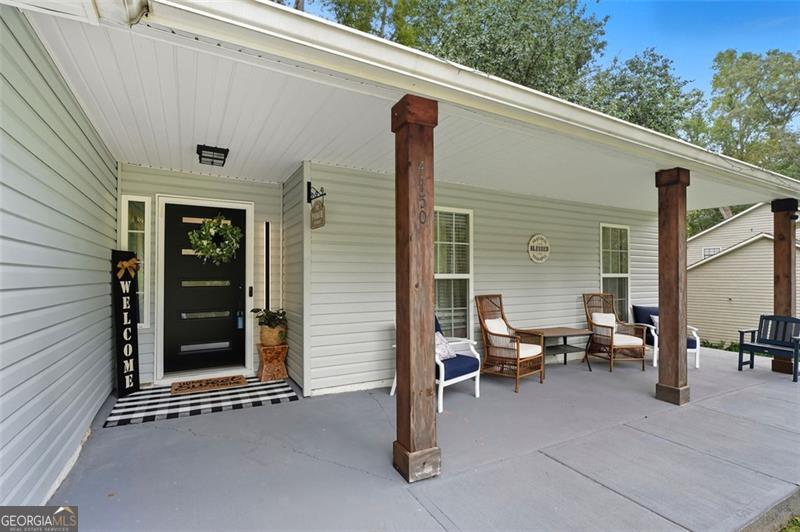 4450 Dorsett Shoals Road Douglasville, GA 30135 - Photo 3 of 36 a view of outdoor space with seating area