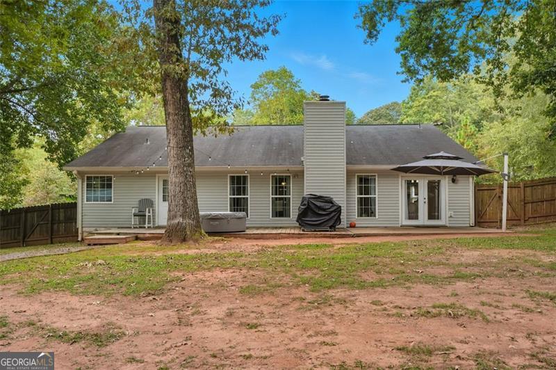 4450 Dorsett Shoals Road Douglasville, GA 30135 - Photo 36 of 36 a front view of a house with a yard and garage
