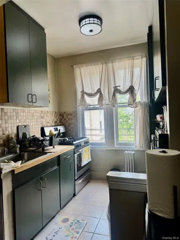 a bathroom with a toilet a sink and a mirror