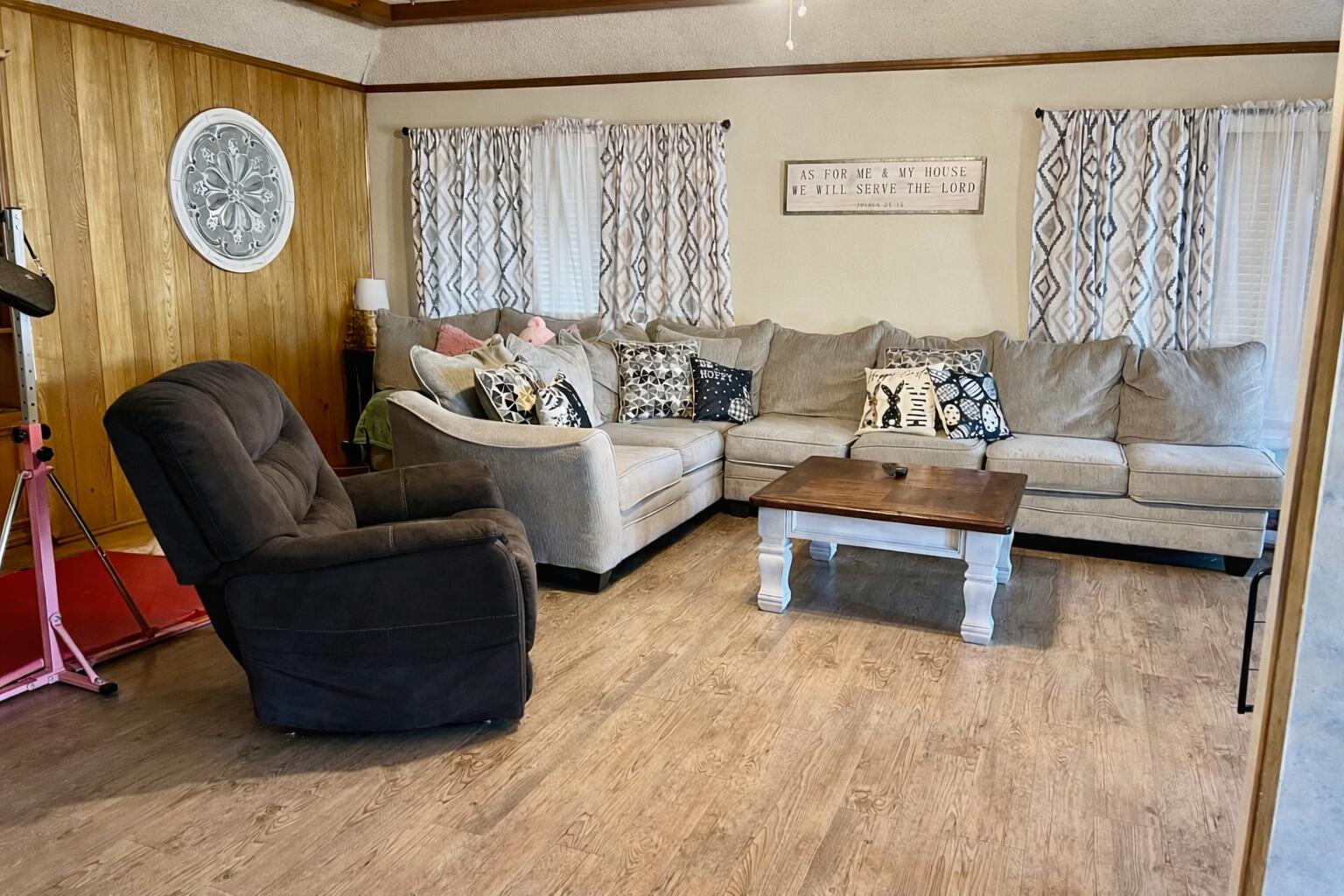 5725 63rd Street Lubbock, TX 79424 - Photo 3 of 14 a living room with furniture and a table