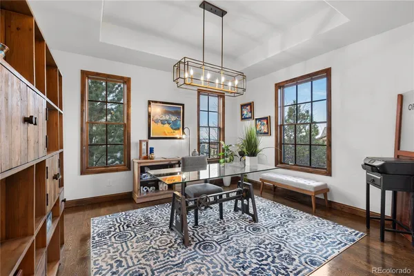 a living room with furniture rug and window