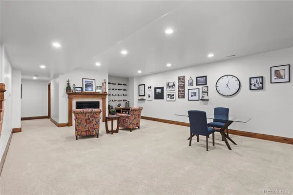 a view of a livingroom with furniture and a chair