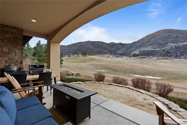 a view of pool with outdoor seating