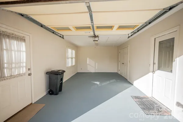 a view of empty room with windows