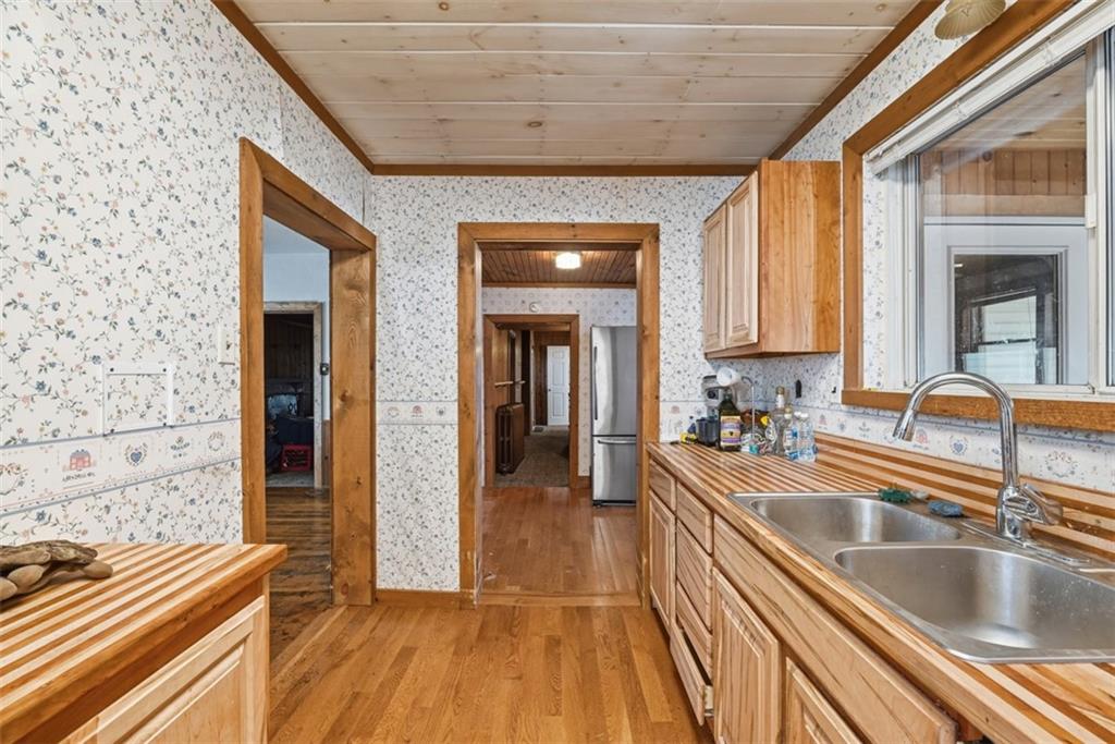 7524 Franklin Road Cranberry Township, PA 16066 - Photo 14 of 44 a view of a kitchen with a sink and cabinets