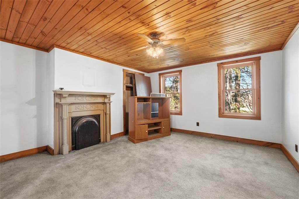 7524 Franklin Road Cranberry Township, PA 16066 - Photo 19 of 44 a view of a livingroom with furniture and a fireplace