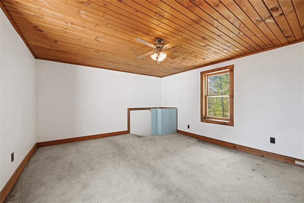 7524 Franklin Road Cranberry Township, PA 16066 - Photo 21 of 44 a view of an empty room with a window