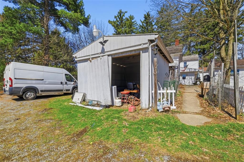 7524 Franklin Road Cranberry Township, PA 16066 - Photo 26 of 44 a view of a house with a big yard and large trees