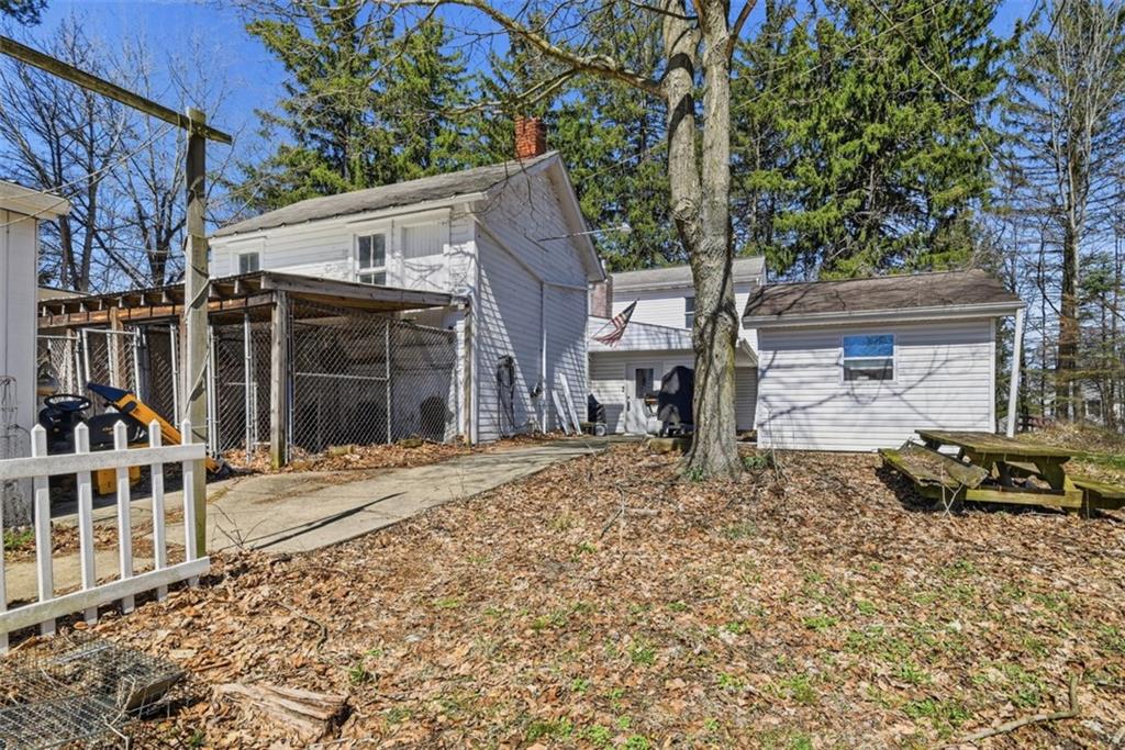7524 Franklin Road Cranberry Township, PA 16066 - Photo 27 of 44 a front view of a house with a yard