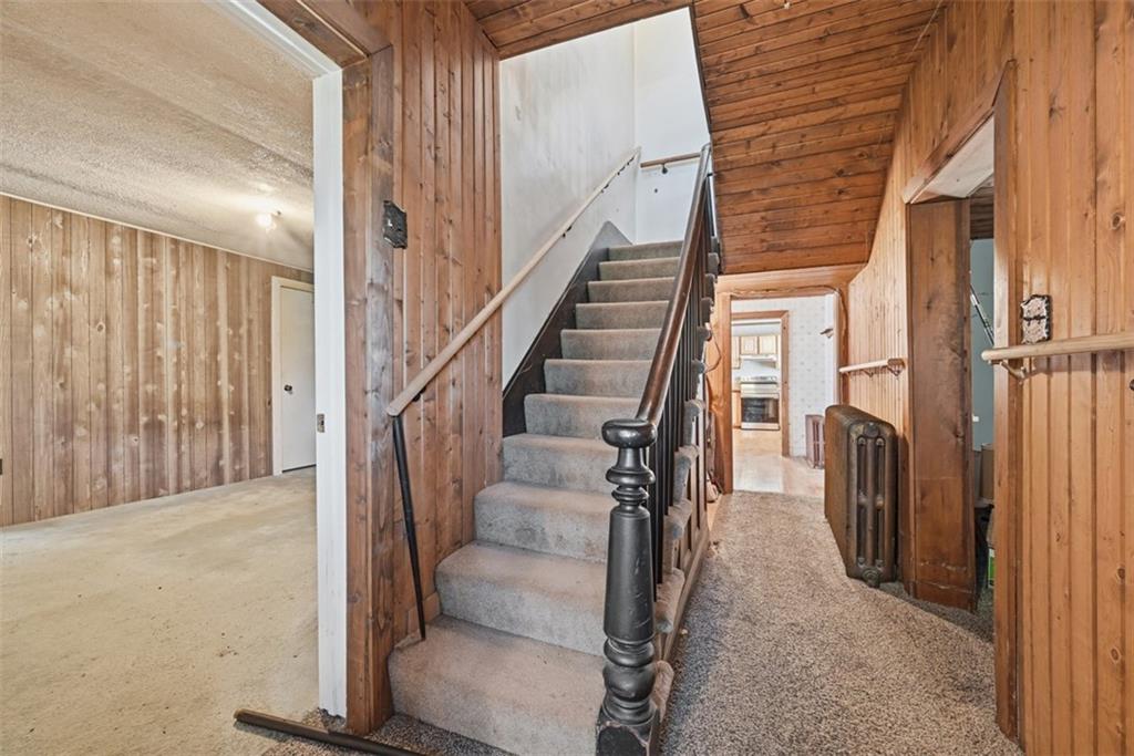7524 Franklin Road Cranberry Township, PA 16066 - Photo 5 of 44 a view of entryway with wooden floor and stairs