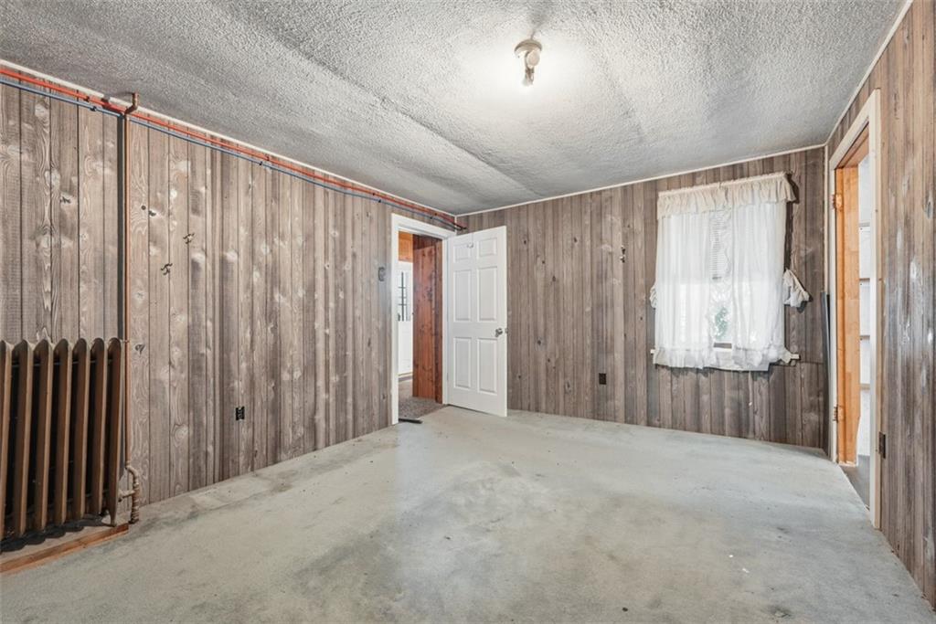 7524 Franklin Road Cranberry Township, PA 16066 - Photo 8 of 44 a view of an empty room with a window
