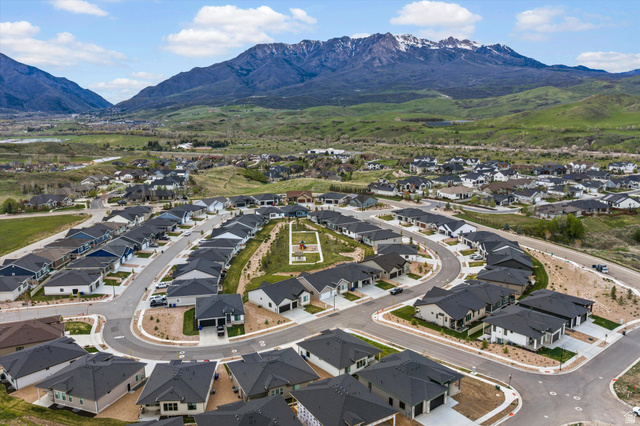 3349 Oxford Loop Morgan, UT 84050 - Photo 43 of 47 Aerial perspective of suburban area featuring mountains