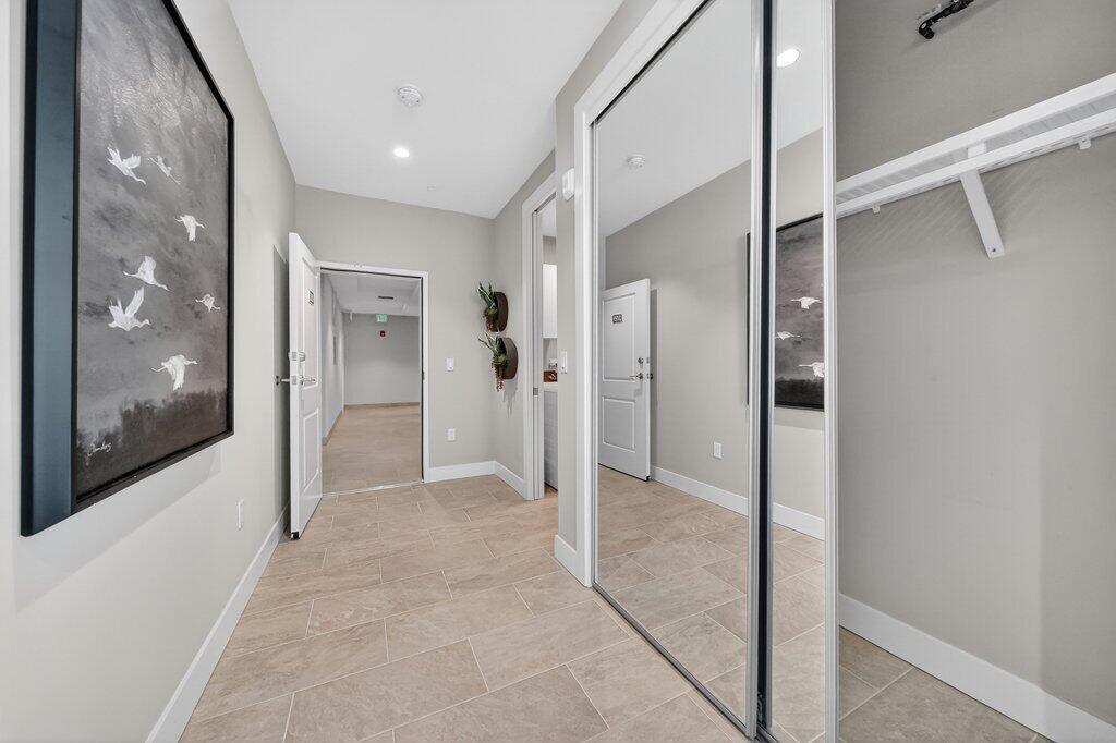 41 Southwest Seminole Street, Unit 209 Stuart, FL 34994 - Photo 15 of 26 a view of a hallway