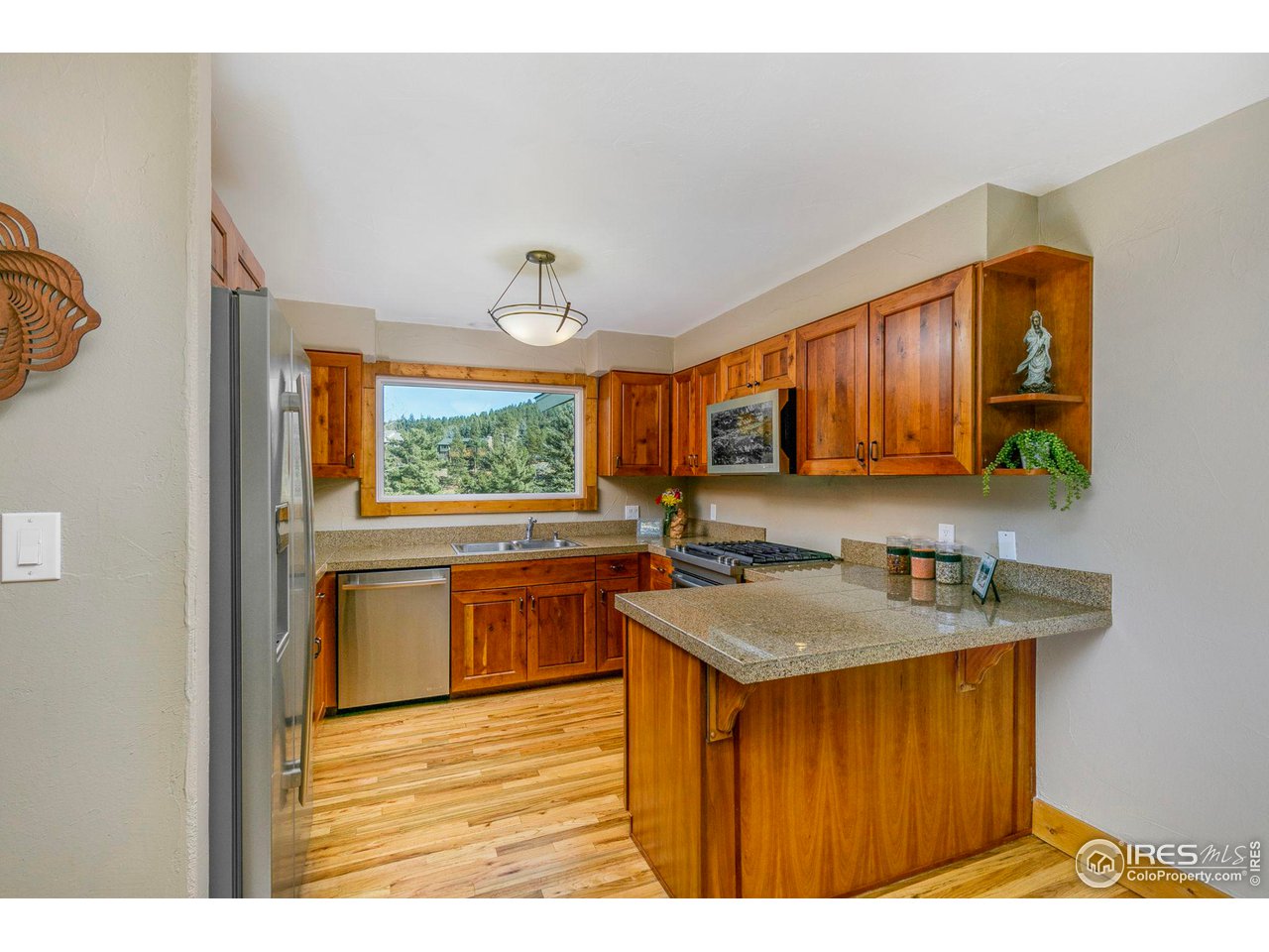 1933 Interlocken Drive Evergreen, CO 80439 - Photo 11 of 40 Enjoy the view from your kitchen window