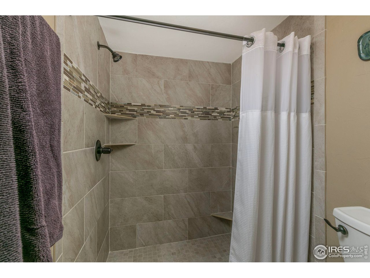 1933 Interlocken Drive Evergreen, CO 80439 - Photo 20 of 40 Newly remodeled primary 3/4 bathroom with large walk-in shower