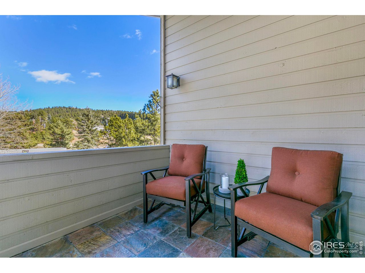 1933 Interlocken Drive Evergreen, CO 80439 - Photo 5 of 40 Front covered patio with slate tile