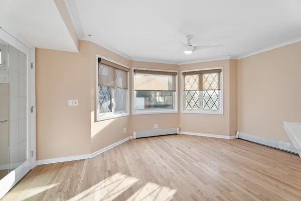a utility room with refrigerator and washer