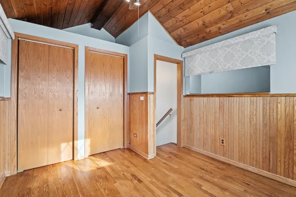 a kitchen with stainless steel appliances granite countertop cabinets and wooden floor