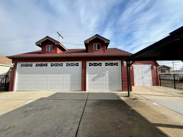 a front view of a house with yard