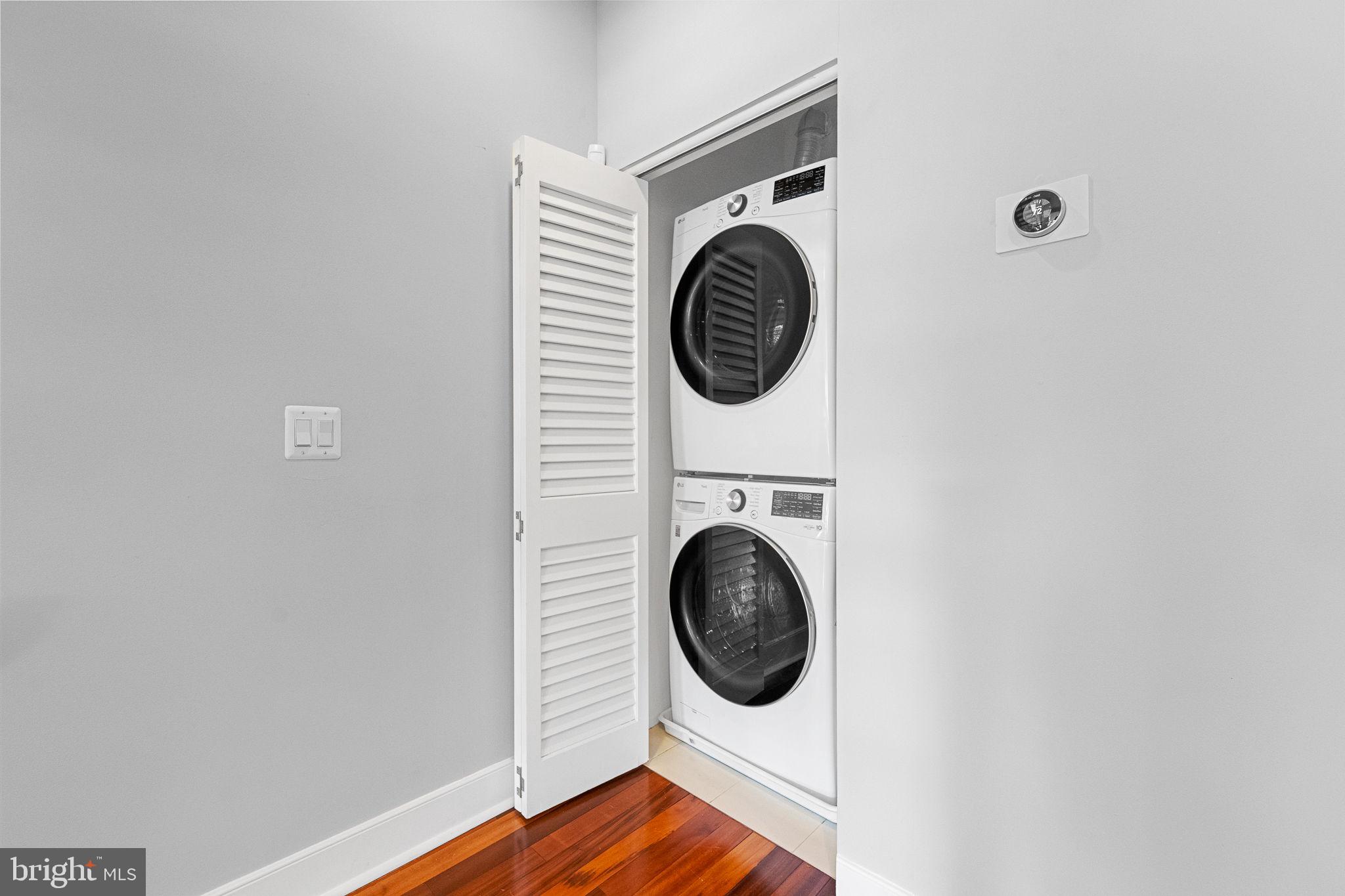 2819 11th Street Northwest, Unit 2 Washington, DC 20001 - Photo 12 of 36 a view of a storage & utility room with dryer and washer