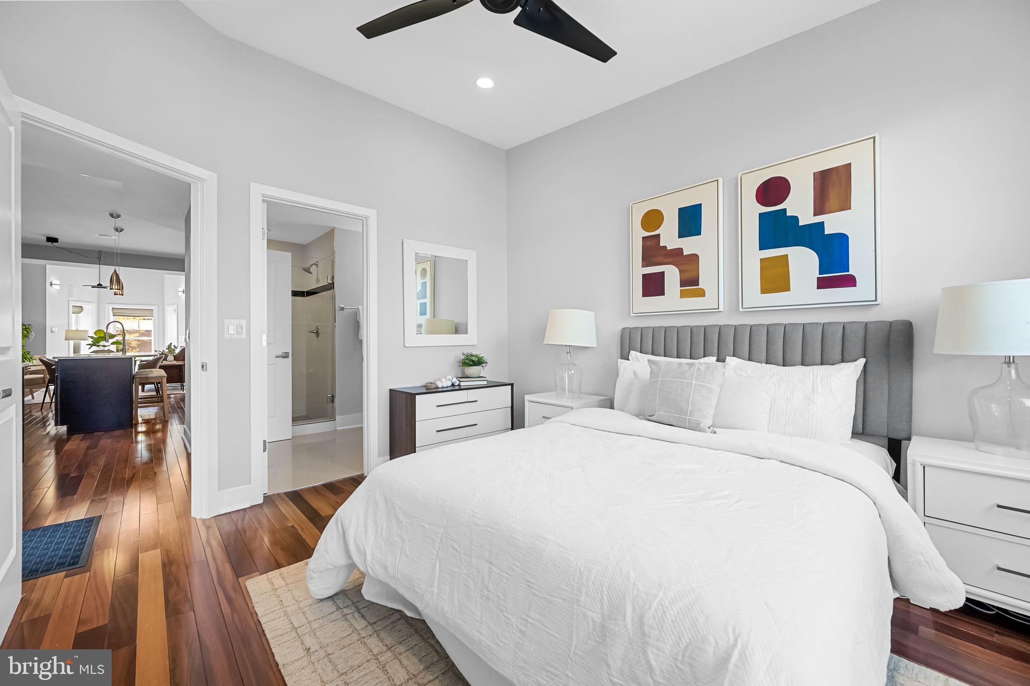 2819 11th Street Northwest, Unit 2 Washington, DC 20001 - Photo 15 of 36 a spacious bedroom with a bed and a book shelf