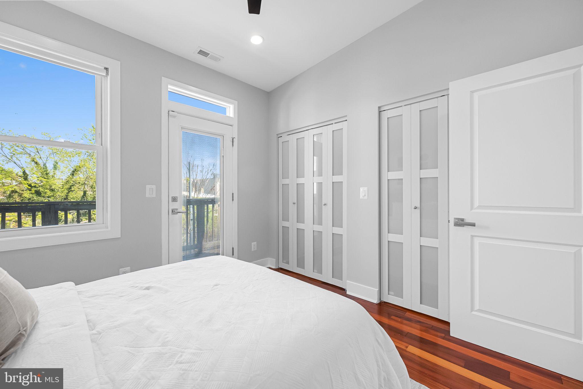2819 11th Street Northwest, Unit 2 Washington, DC 20001 - Photo 17 of 36 a bedroom with a bed and a window