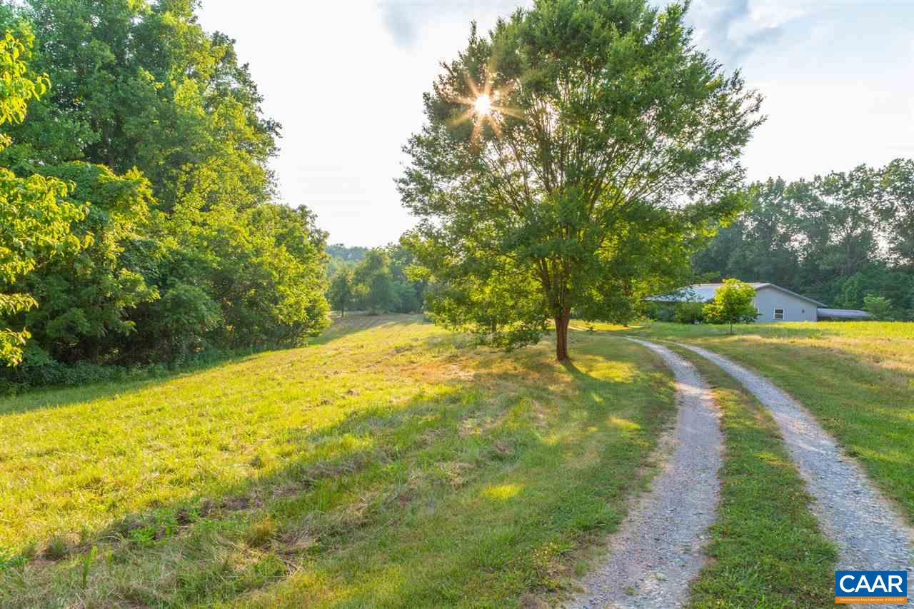 1139 Spencer Road Dillwyn, VA 23936 - Photo 20 of 29 a view of a yard with swimming pool