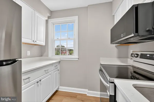 a utility room with washer and dryer
