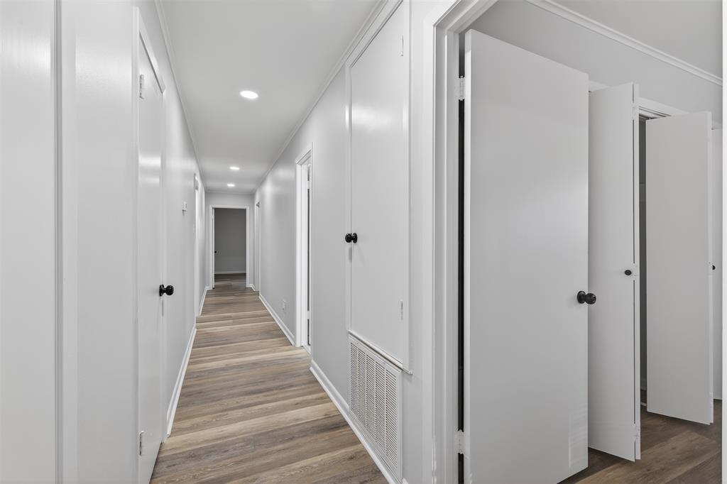 522 Lee Street Mansfield, LA 71052 - Photo 12 of 20 a view of a hallway with the wooden floor
