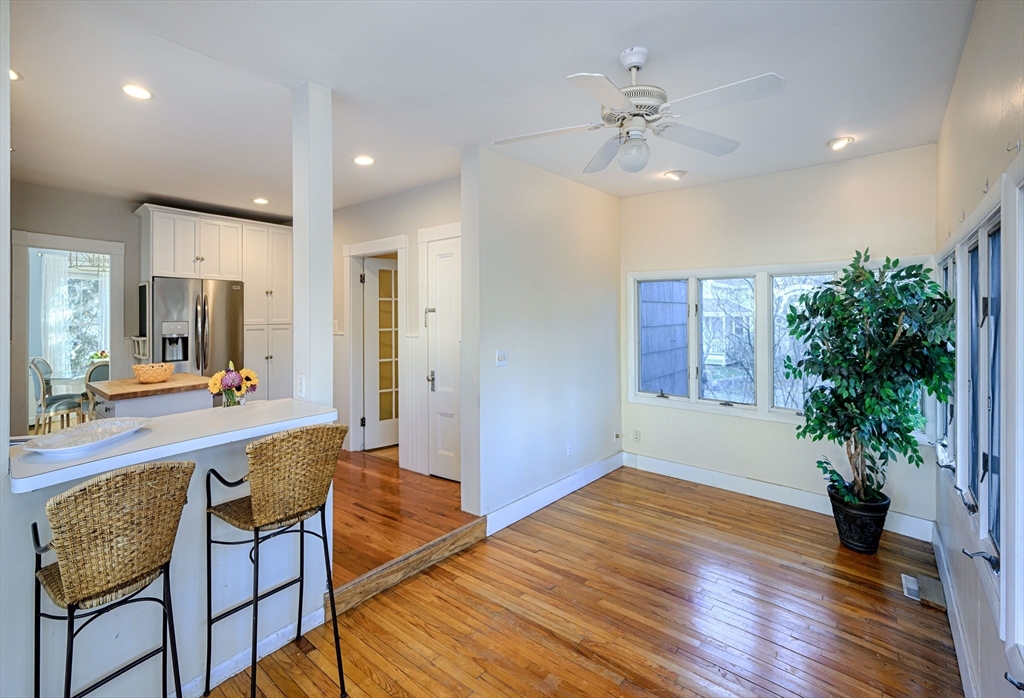 31 Marion Street Natick, MA 01760 - Photo 16 of 32 a living room with furniture and a potted plant